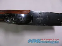 7725 Winchester 101 field skeet 28 gauge 28 inch barrels sk/sk 98+ % condition, WINCHESTER BROCHURE, CORRECT WINCHESTER SERIALIZED BOX TO GUN, pistol grip with cap, vent rib, ejectors, Winchester butt plate, all original, 2 brass bead, hard