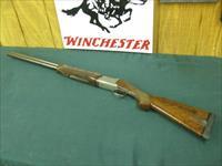 7277 Winchester 101 Grand European 12 gauge, 28 inch barrels mod/full, AAA++FANCY HIGHLYL FIGURED WALNUT, all original, lop factory 14 1/4. top of the line,98% condition, very hard to get. less than 500 mfg.vent rib ejectors, 2 beads,100% e Img-1