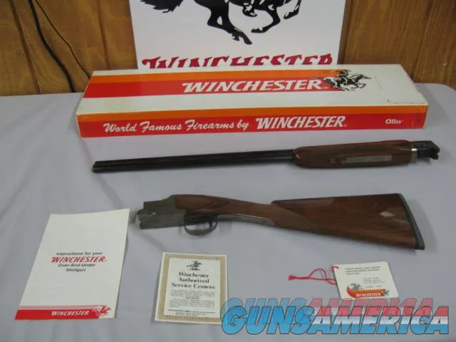 7646  Winchester 101 Pigeon XTR LIGHTEIGHT BABY FRAME, 28 gauge, 28 inch barrels ic/mod, RARE long barrel length with open chokes, STRAIGHT GRIP,quail/snipe engraved coins silver receiver. Winchester pad, all original, AS NEW in CORRECT Win Img-1