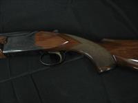 6659 Winchester 101 20 gauge 28 inch barrels, 2 3/4 & 3 inch chambers, mod/full, pistol grip ejectors, vent rib Winchester butt plate. handling marks 95% condition. all original, opens closes tite, bores brite/shiny. Img-3